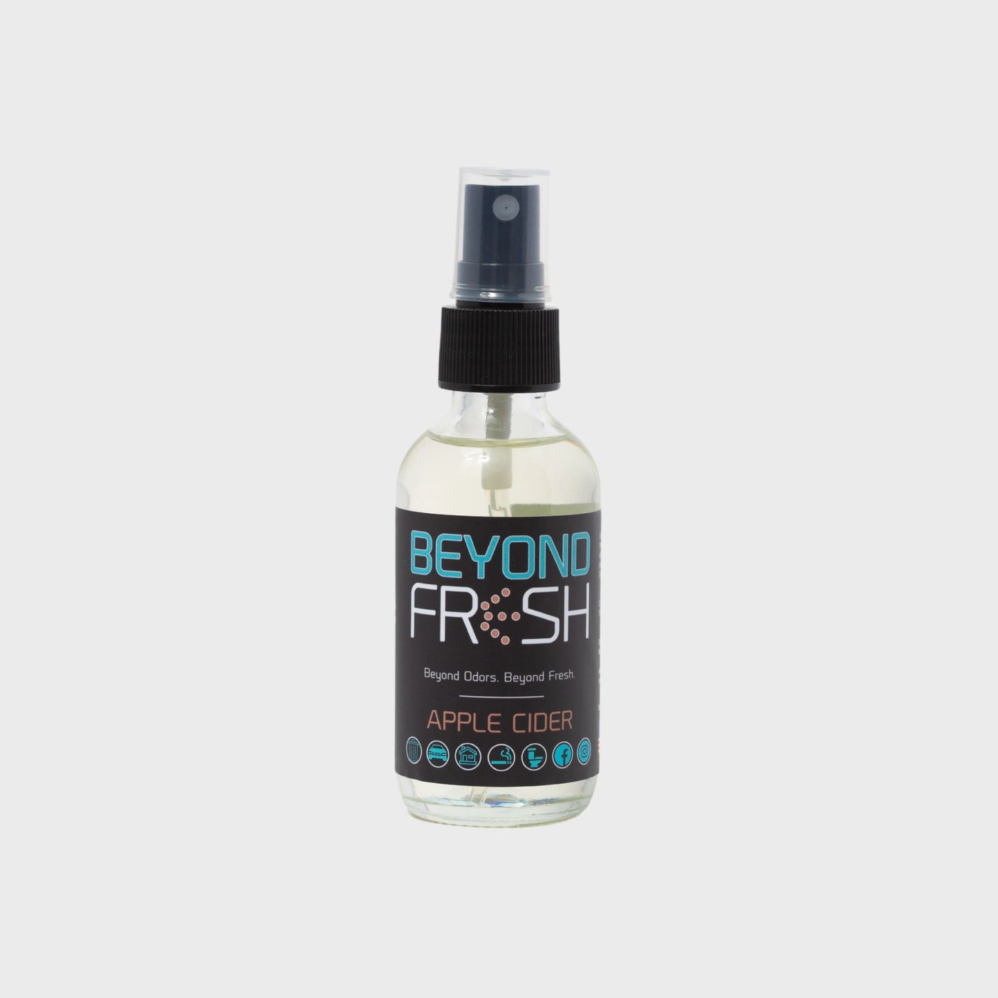 Bottle of 'Beyond Fresh' Apple Cider scented spray on a white background.