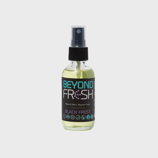 Bottle of 'Beyond Fresh' Black Frost scented spray on a white background.