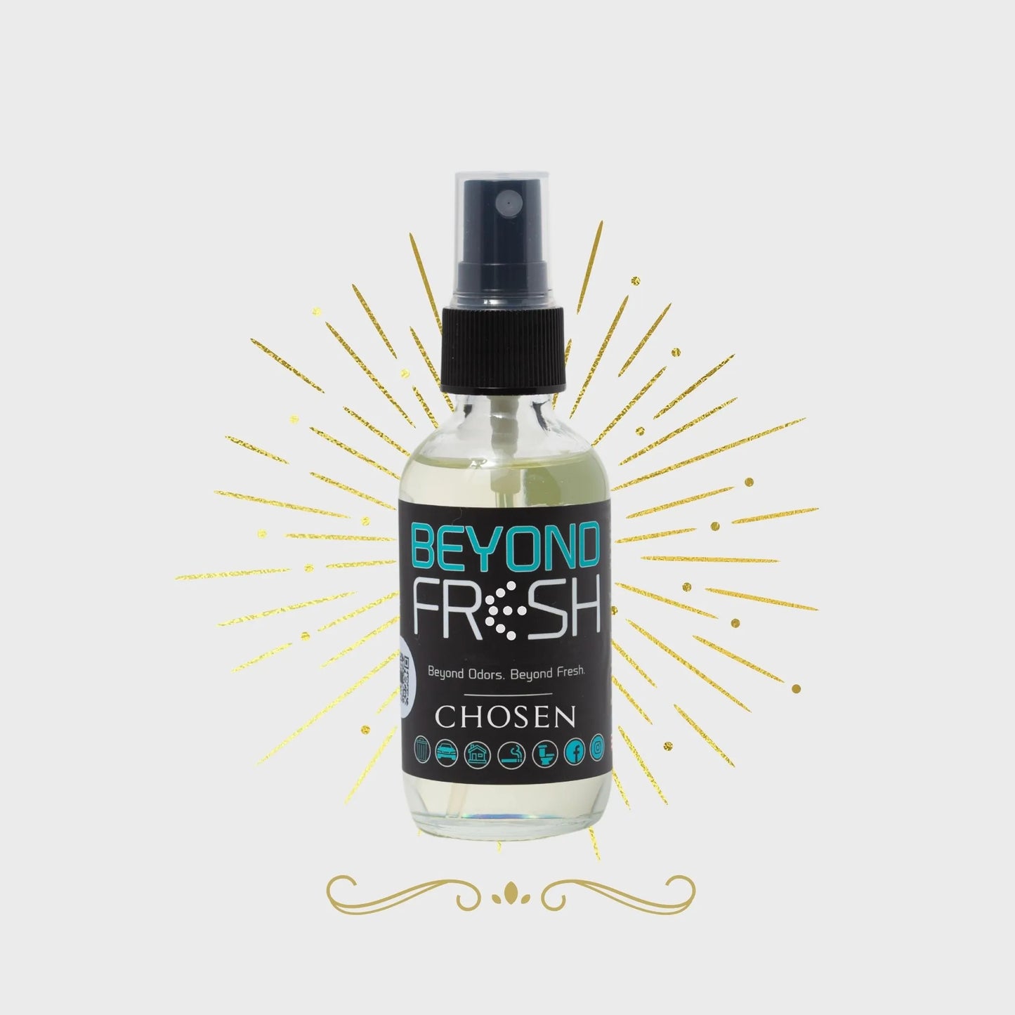 Bottle of 'Beyond Fresh' CHOSEN scented spray with golden sparks on a white background.
