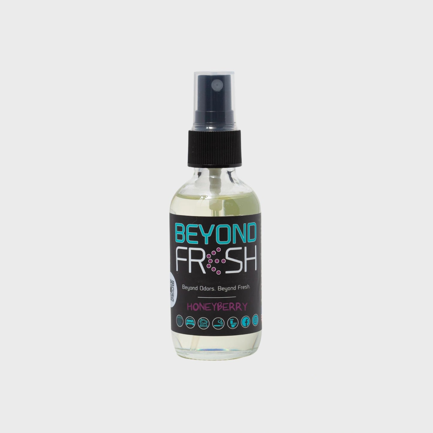 Bottle of 'Beyond Fresh' Honeyberry scented spray on a white background.