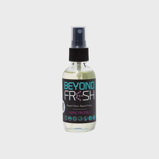 Bottle of 'Beyond Fresh' Honeyberry scented spray on a white background.