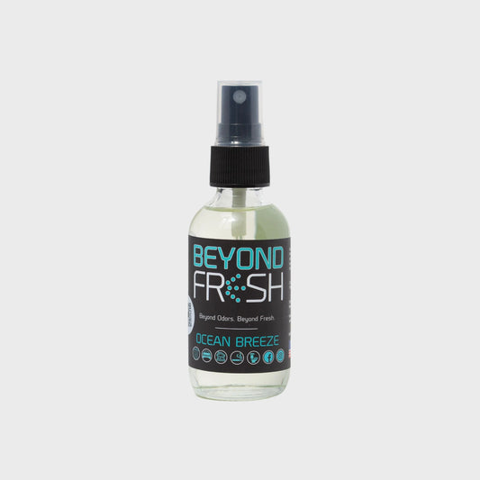 Bottle of 'Beyond Fresh' Ocean Breeze scented spray on a white background.