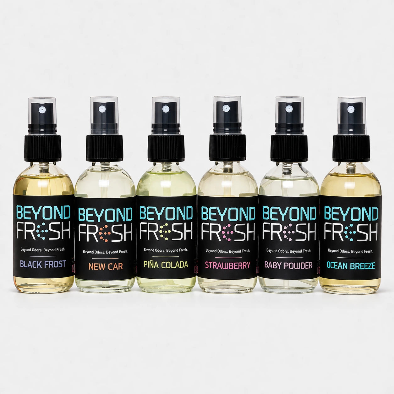 Six bottles of 'Beyond Fresh' air fresheners with different scents on a white background.