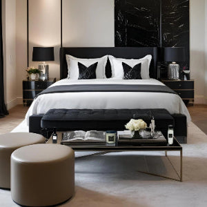 Modern bedroom with black and white furniture. Home Collection products showcased on center table.