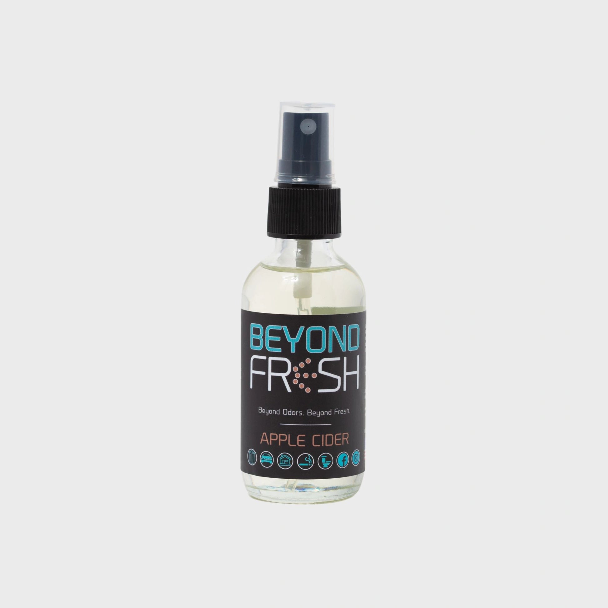 Bottle of 'Beyond Fresh' Apple Cider scented spray on a white background.