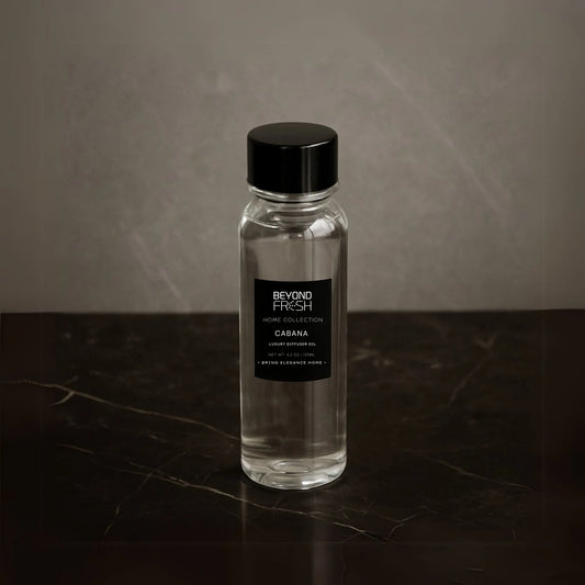 125 ml bottle of Home Collection Diffuser Oil Refill, Cabana Scent with a marble background.