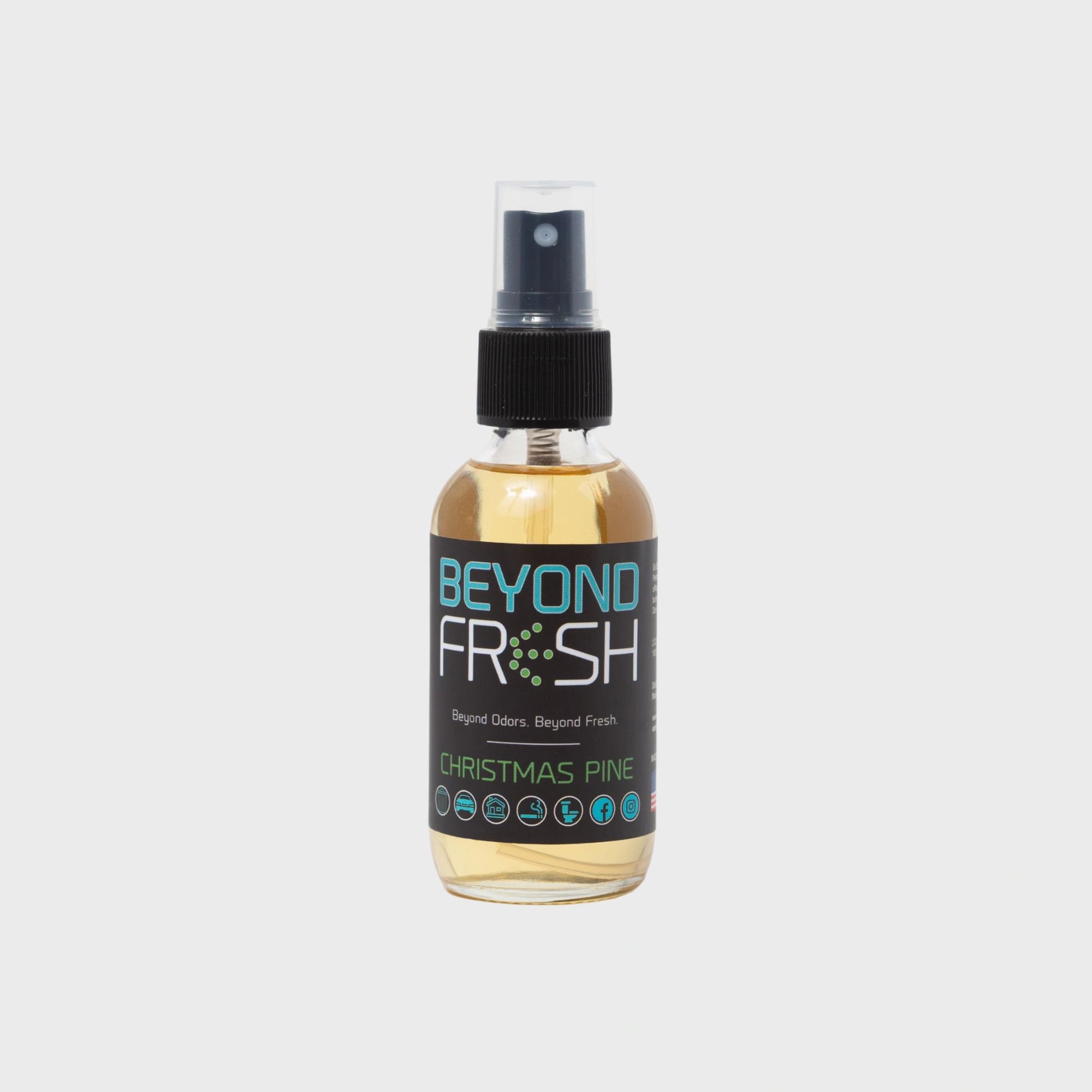 Bottle of 'Beyond Fresh' Christmas Pine scented spray on a white background.