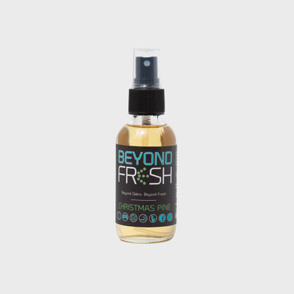 Bottle of 'Beyond Fresh' Christmas Pine scented spray on a white background.
