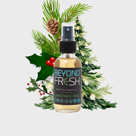 Bottle of 'Beyond Fresh' Christmas Pine air freshener with festive background