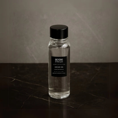 125 ml bottle of Home Collection Diffuser Oil Refill, Dream On Scent on a marble background