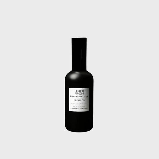 100 ml black bottle of Home Collection Room Spray, Dream On scent on white background