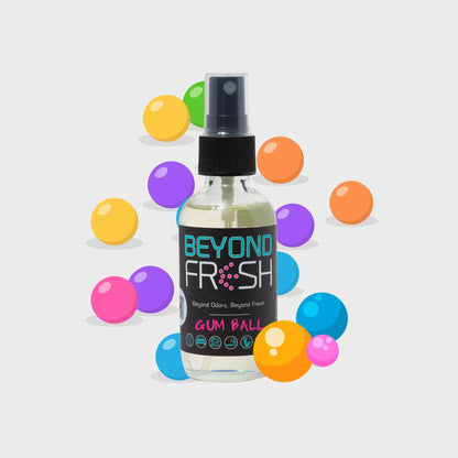 Bottle of 'Beyond Fresh' gum ball scented spray with colorful bubbles on a white background.