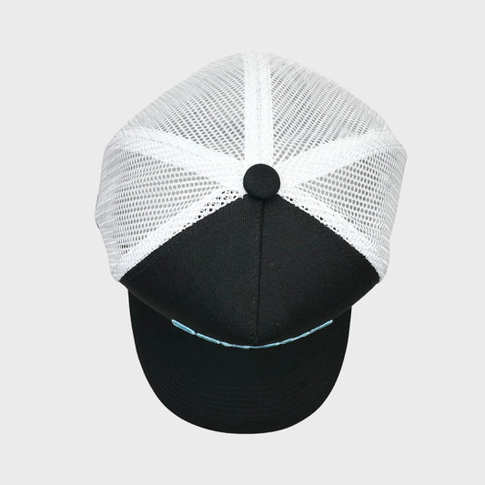 Black and white cap with mesh back on a light gray background