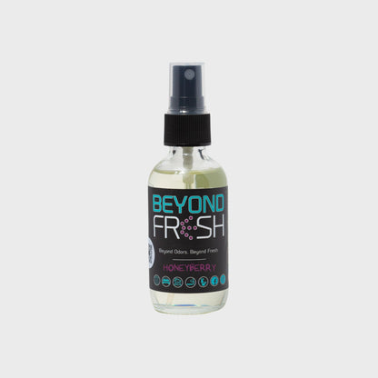 Bottle of 'Beyond Fresh' Honeyberry scented spray on a white background.