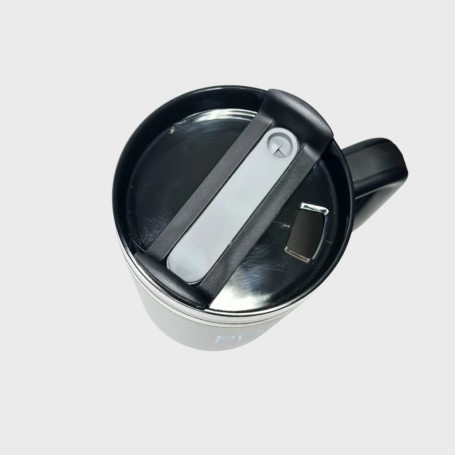 Black insulated tumbler lid on a light gray background