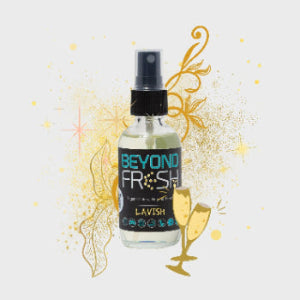 Bottle of 'Beyond Fresh' Lavish scented spray with cold decorations on a white background.