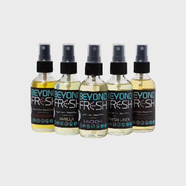 Five bottles of Beyond Fresh spray on a white background