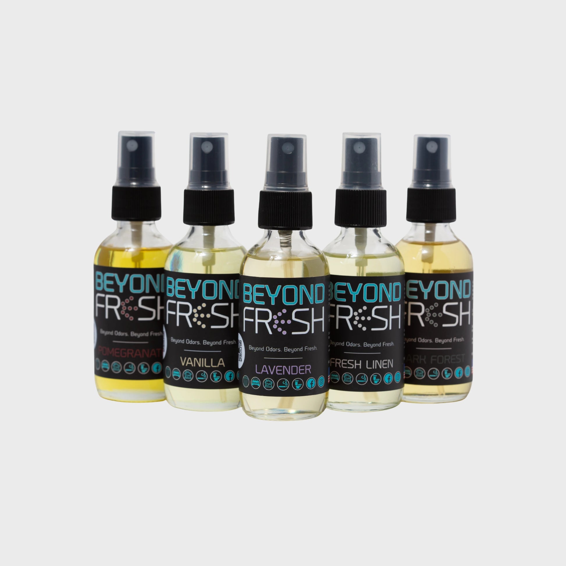 Five bottles of Beyond Fresh spray on a light gray background