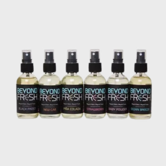 Six bottles of Beyond Fresh spray on a white background.