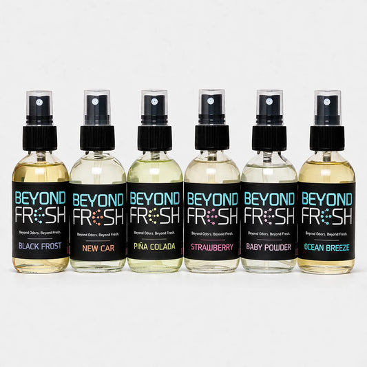 Six bottles of 'Beyond Fresh' air fresheners with different scents on a white background.