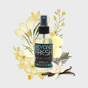 Bottle of 'Beyond Fresh' gum ball scented spray with floral and vanilla beans elements on a white background.